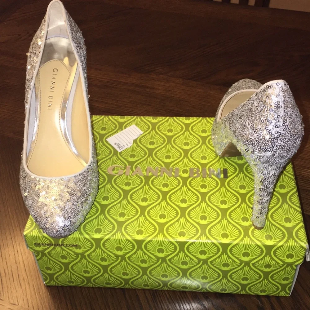 Trending, glam- high heels- Gianni Bini; Silver Heels; 8.5